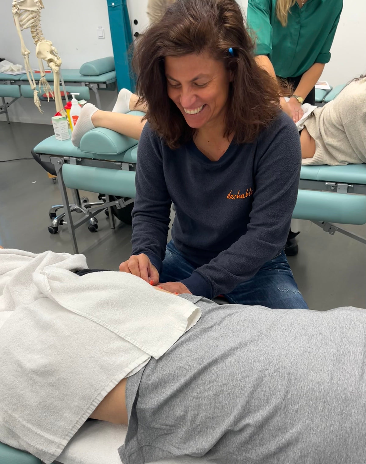 Daša working with a patient in a clinic
